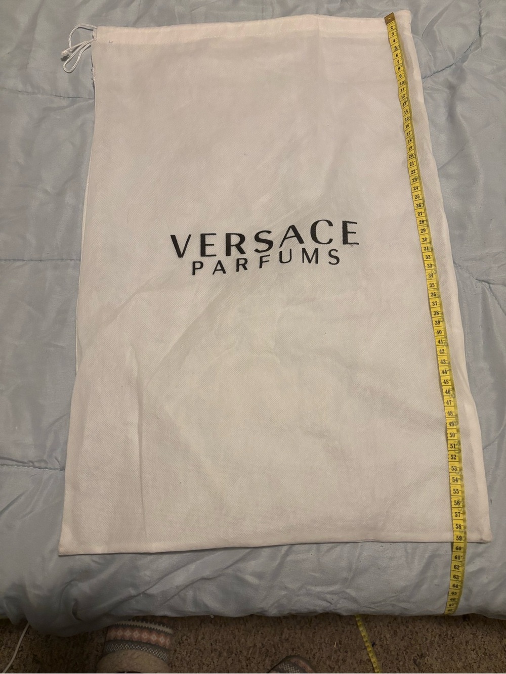 White Fabric Drawstring Bag with Black Logo
